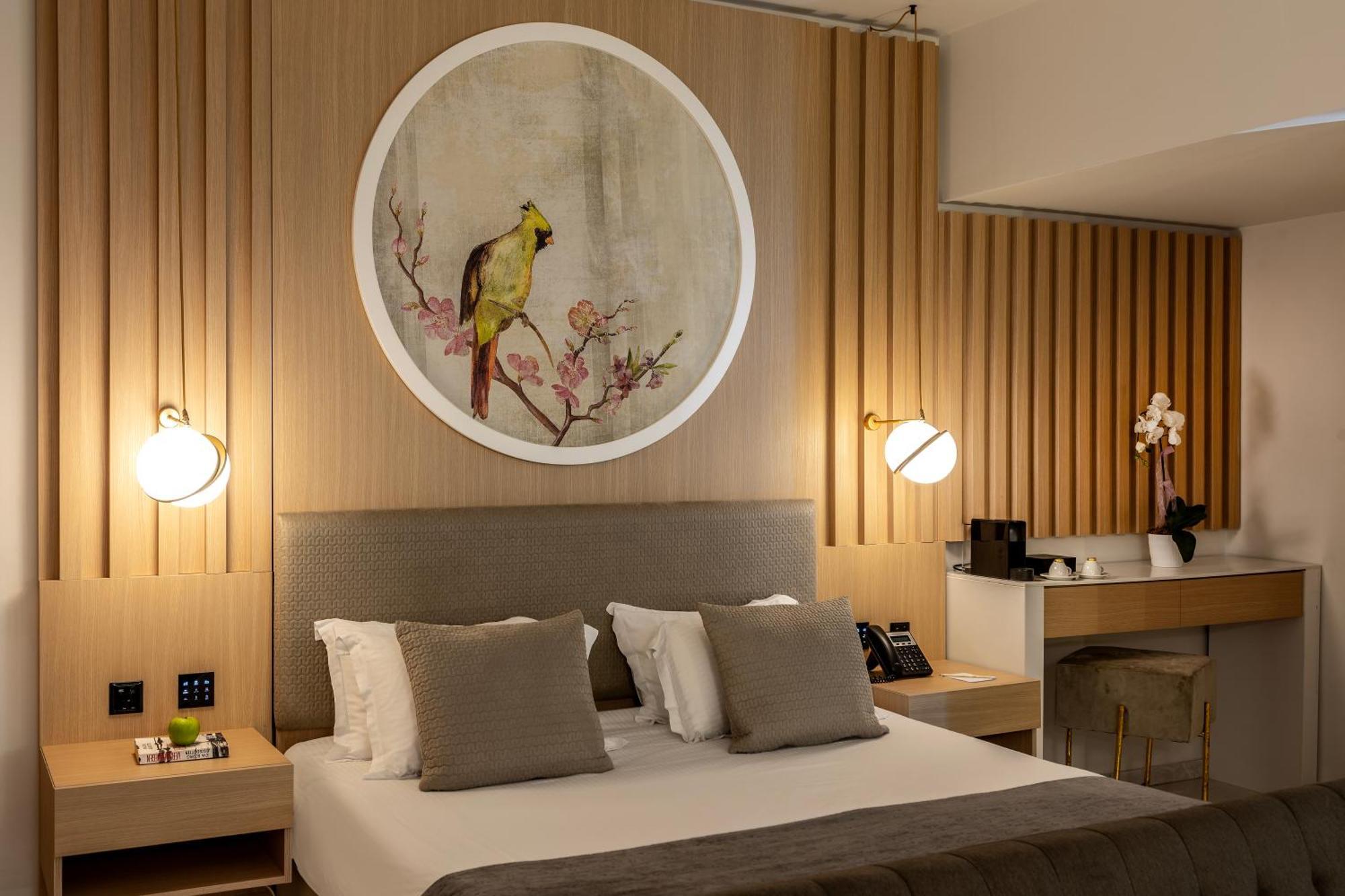 นิสซิบลู บีช รีสอร์ต Hotel ไอยานาปา ห้อง รูปภาพ A bedroom at the hotel